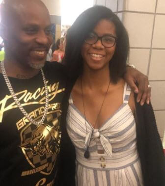Praise Mary Ella Simmons with her father DMX.